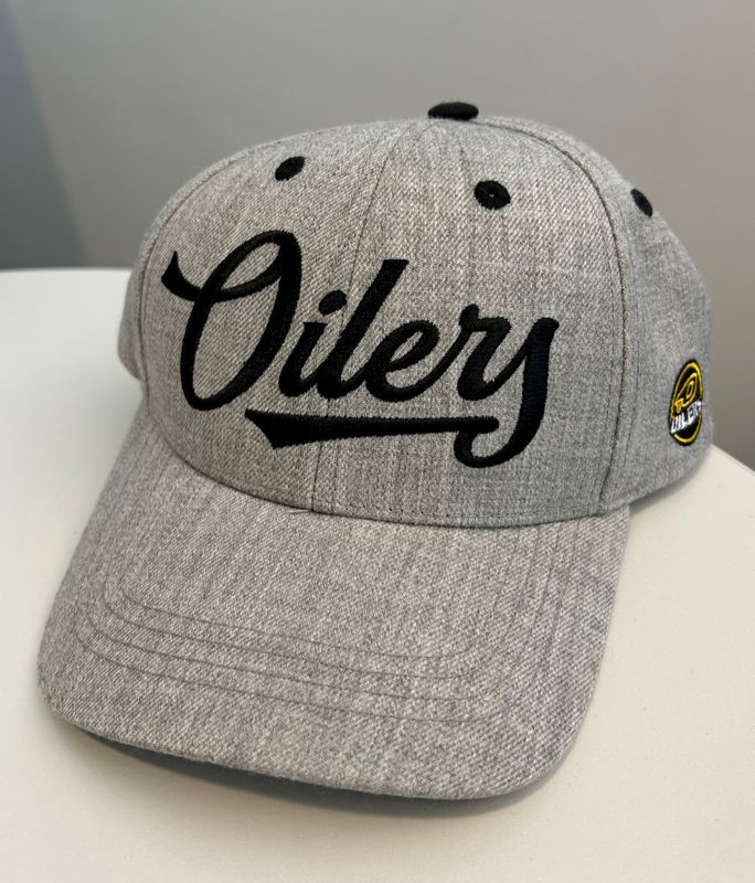 Curved caps grå