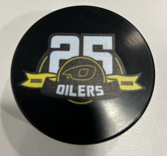 Puck med 25-års jubileumslogo